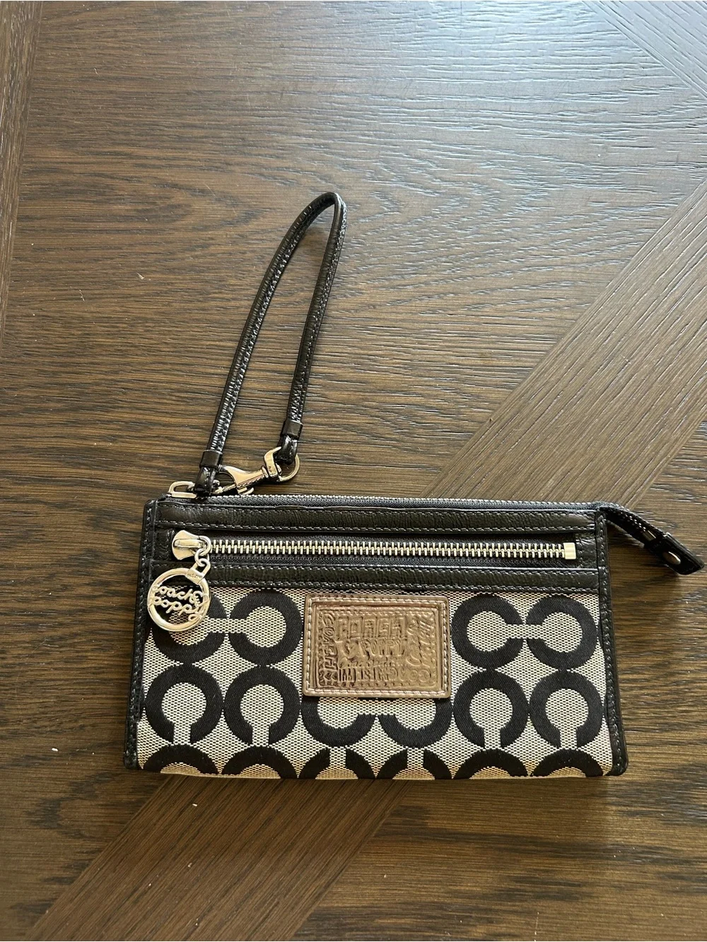 Coach Poppy Black and Cream Signature Wristlet
